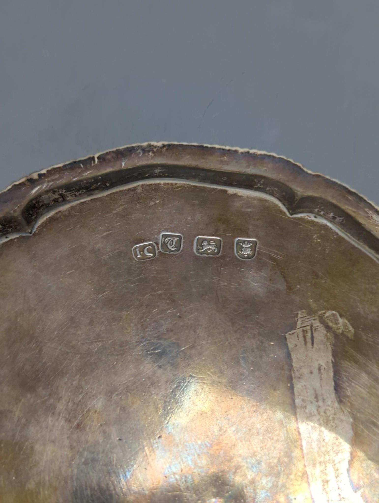 A George III circular silver card tray, London, 1774 by John Carter, 15.8cm, 7.5oz.